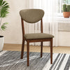 Brown wooden dining chair with padded seat and angled backrest, perfect for dining rooms and kitchens.