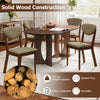 Wooden dining chairs set of 4 with padded seats and angled backrests, crafted from solid rubber wood for stability.