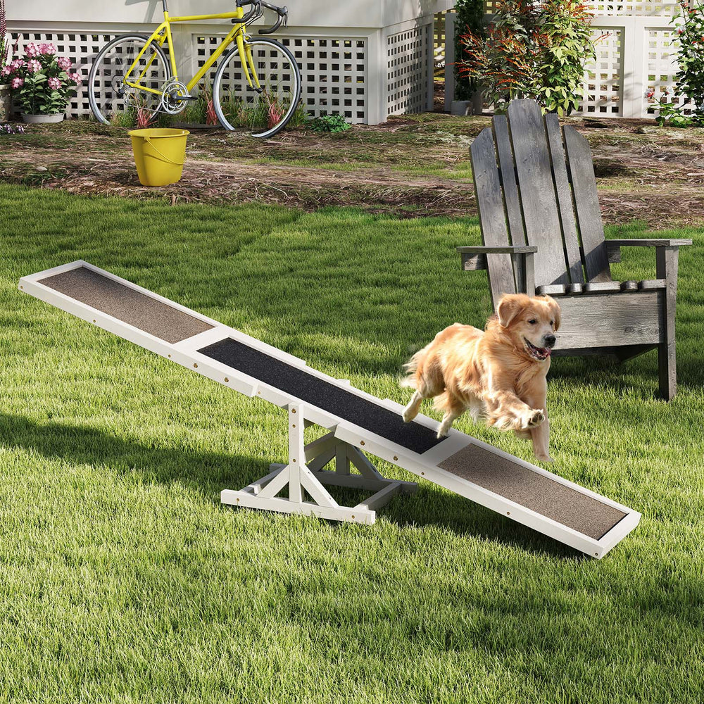 Wooden dog agility seesaw made of spruce wood with a high-traction surface, perfect for outdoor training and exercise.