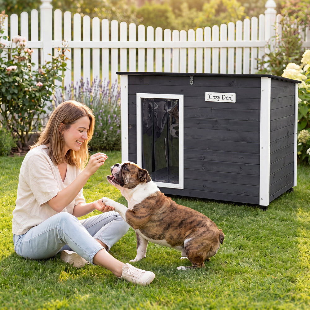 Wooden dog house with a coated spruce frame, openable asphalt roof, and removable floor for easy cleaning and comfort.