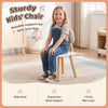 Wooden kids desk and chair set in white, shown with a child seated at the ergonomic chair in a bedroom.