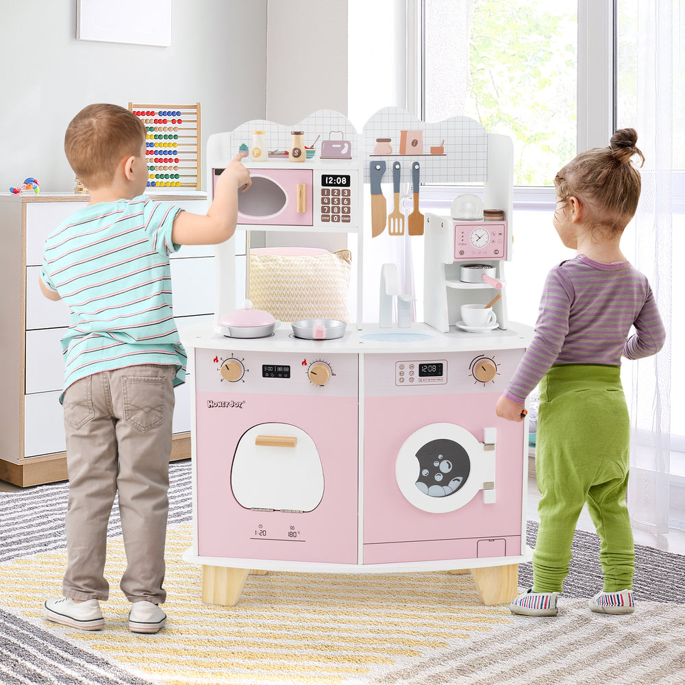 Wooden kids kitchen playset in pink featuring a coffee maker, microwave, and stove, perfect for imaginative play.