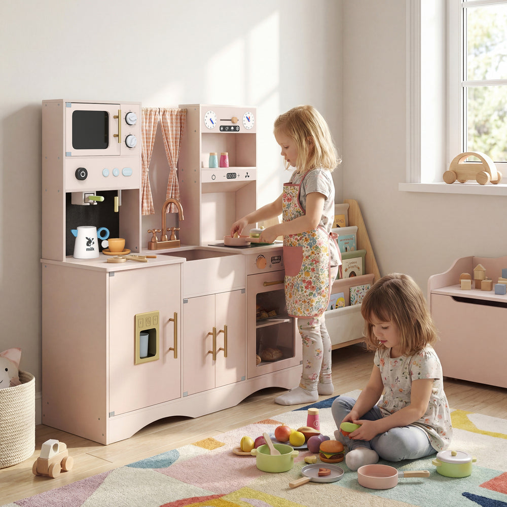 Wooden pink kids' pretend play kitchen with microwave, coffee maker, and accessories for imaginative cooking fun.