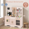 Wooden kids pretend play toy kitchen in pink features a microwave, coffee maker, and ample storage for imaginative play.