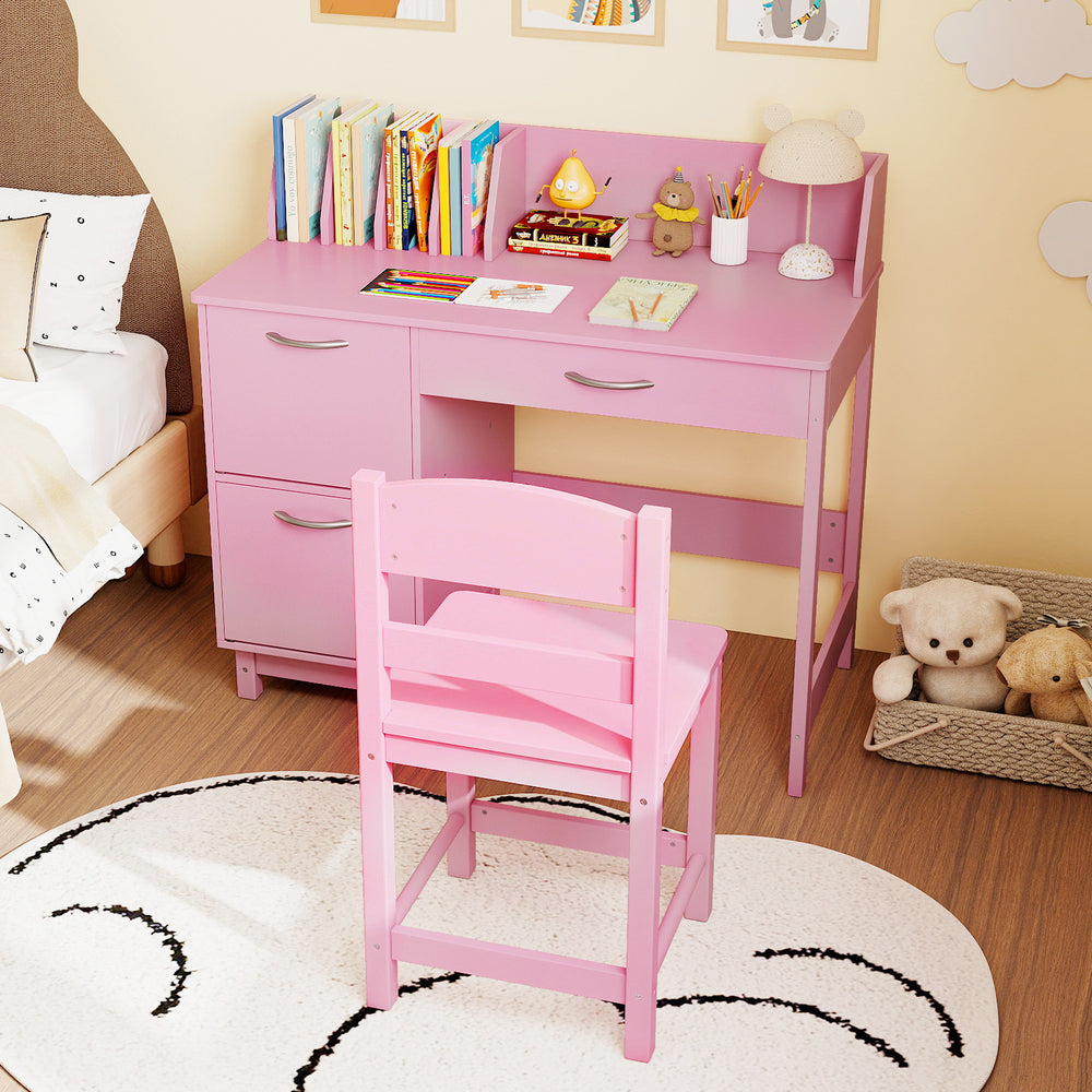 Pink wooden kids study desk and chair set with storage drawers and book sorters for organized study space.