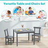 Gray wooden kids table and two chairs set with anti-slip foot pads, ideal for drawing, reading, and playing.