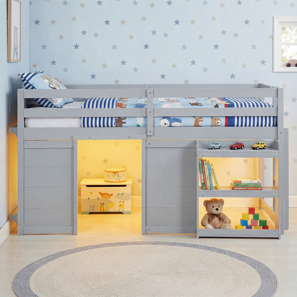 Wooden low kids loft bed in gray with LED lights, under-bed play area, and ample storage for toys and books.