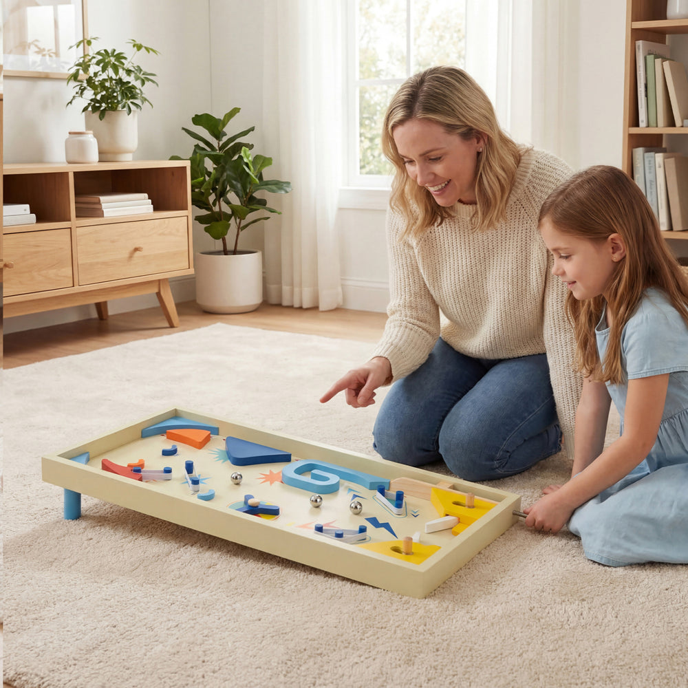 Wooden pinball machine for kids and adults, featuring colorful flippers and three metal marbles for interactive fun.