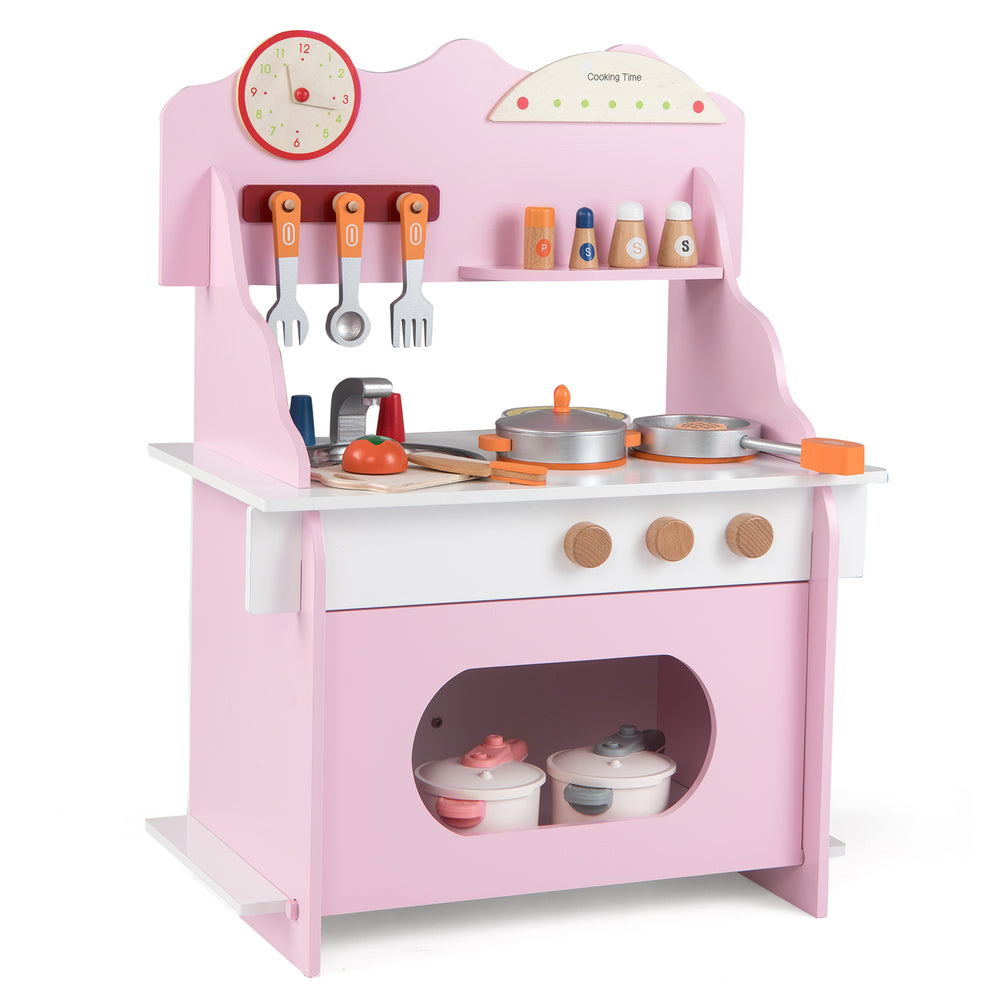 Wooden play kitchen set in pink with clock, accessories, and storage for imaginative pretend play for kids aged 3+.