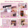 Wooden play kitchen set in pink and white features realistic lights and sounds, including a microwave, oven, and ice maker.