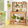 Wooden potting bench table with 3-tier open shelf, ideal for gardening tasks and plant organization in indoor or.