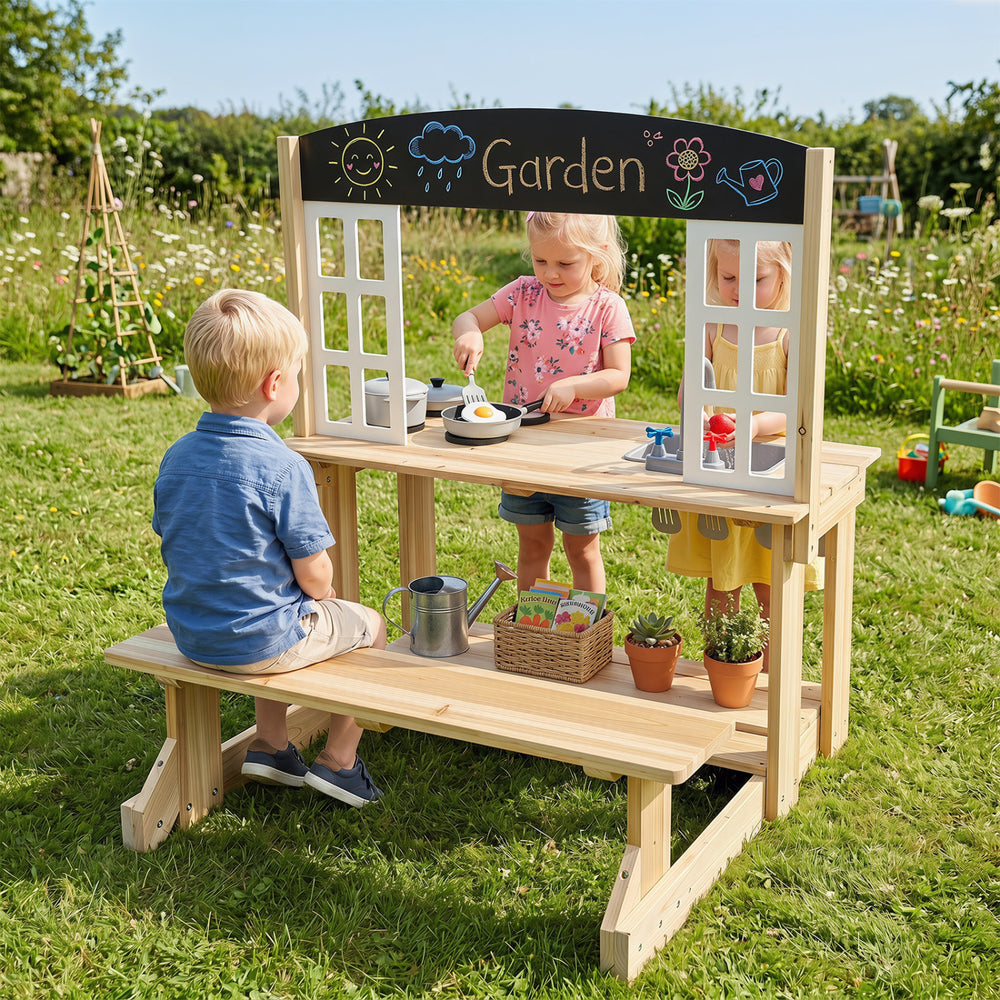 Wooden pretend play kitchen with bench, featuring stoves, sink, and accessories for imaginative outdoor play.