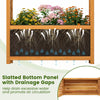 Slatted bottom panel of the wooden raised garden bed promotes drainage and air circulation for healthy plant growth.