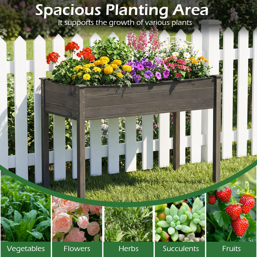 Wooden raised vegetable garden bed in gray, 4 ft long, perfect for growing various plants in your garden or patio.