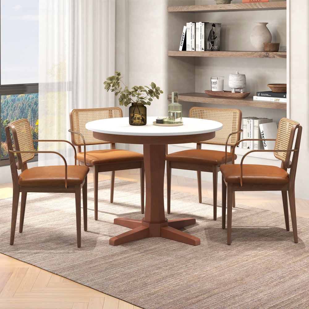 Round wooden dining table with pedestal base in cream white, featuring sturdy rubber wood and elegant design for.