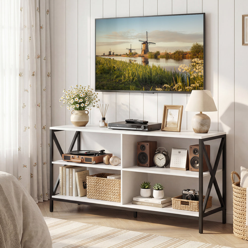 Stylish white wooden TV stand with X-shaped frame, ample storage for TVs up to 55 inches, perfect for modern living rooms.