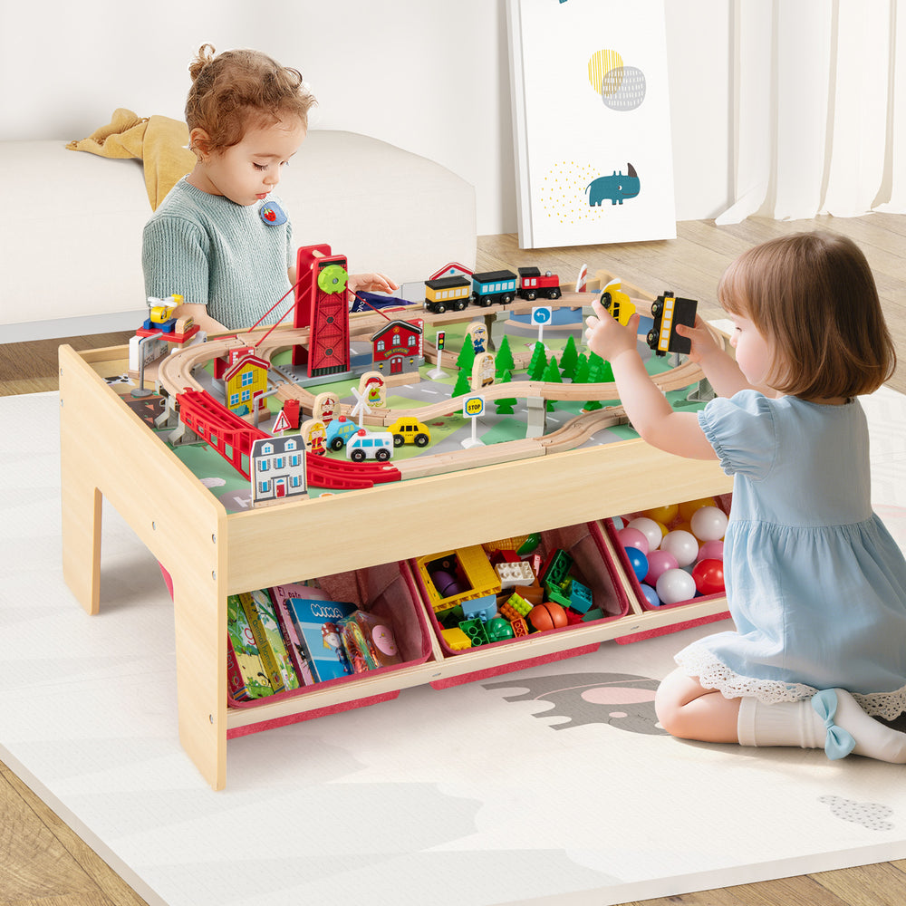 Wooden train set table with reversible tabletops, featuring 94 accessories for imaginative play, perfect for kids over.