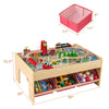 Wooden train set table with reversible tabletops, 94 accessories, and 3 fabric drawers for organized play.