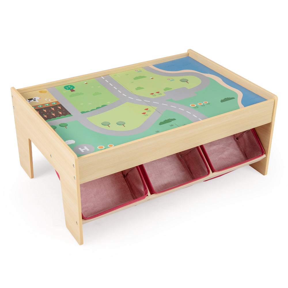 Kids multipurpose activity play table with reversible tabletops and three fabric drawers for easy storage and play.