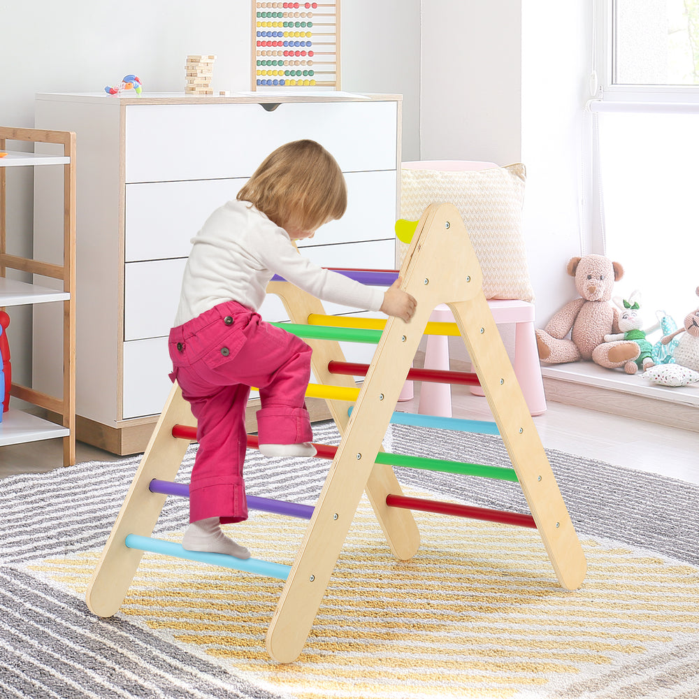 Child climbing on the 2-in-1 wooden triangle climber set with multicolor bars, promoting balance and motor skills.