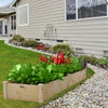 Wooden vegetable raised garden bed made of solid fir wood, ideal for planting in backyard or patio settings.