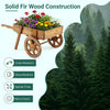 Wooden wagon planter with wheels made of solid fir wood, perfect for indoor and outdoor flower displays.