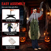Life-size Zombie Halloween decoration features glowing red eyes, bloody outfit, and simulated knife for terrifying outdoor displays.