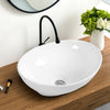 Contemporary oval ceramic vessel sink with popup drain design, perfect for upgrading bathrooms in home or commercial.
