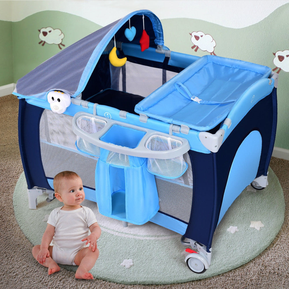 Foldable baby crib playpen in blue with mosquito net, storage pockets, and detachable changing table for travel.