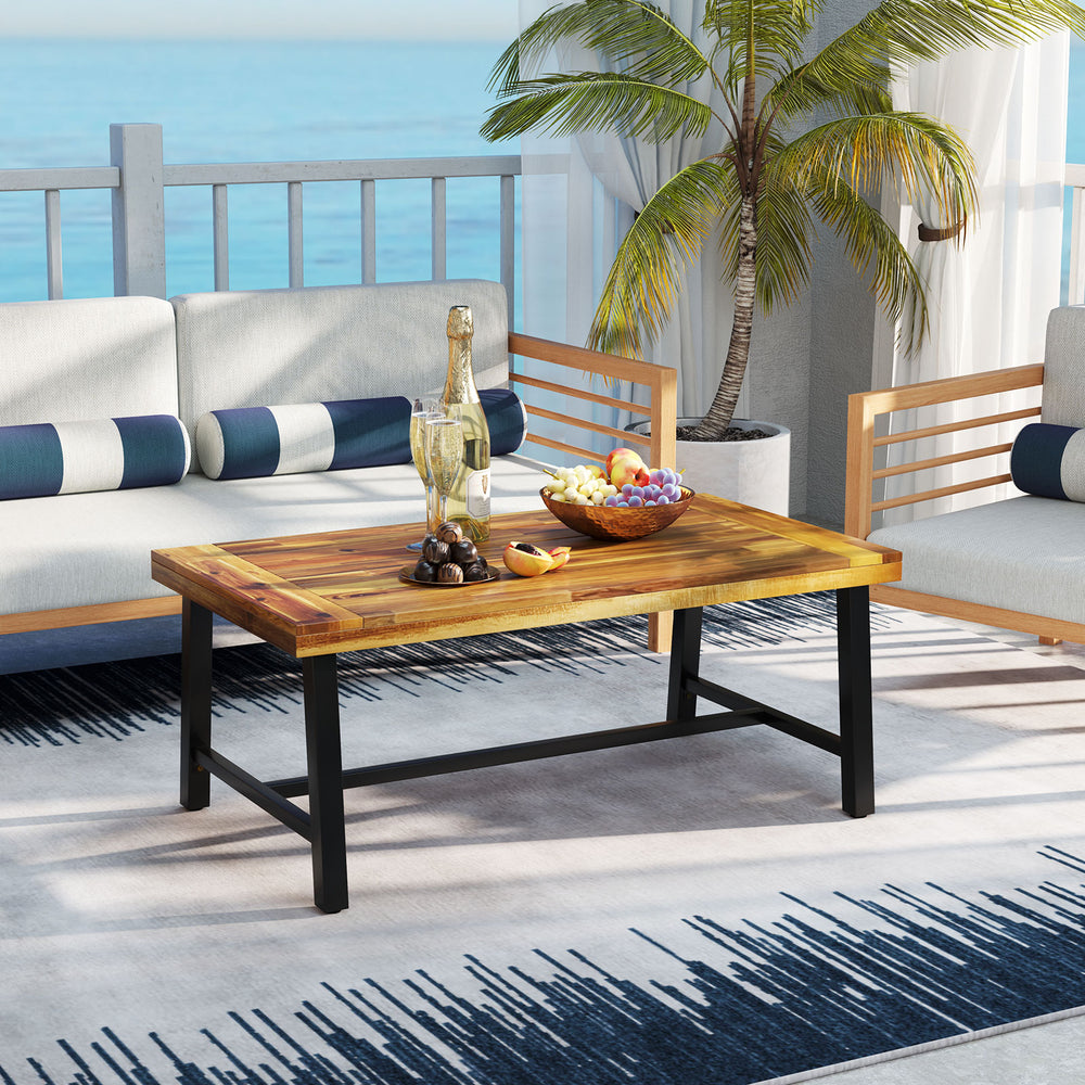 Acacia wood coffee table with thickened top and heavy-duty metal legs, perfect for outdoor gatherings and decor.