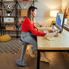 Adjustable-height gray wobble chair for active learning, designed for children to promote good posture and.