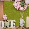 Artificial grass wall panels in light green, ideal for garden or party decor, showcasing a lush appearance and easy.
