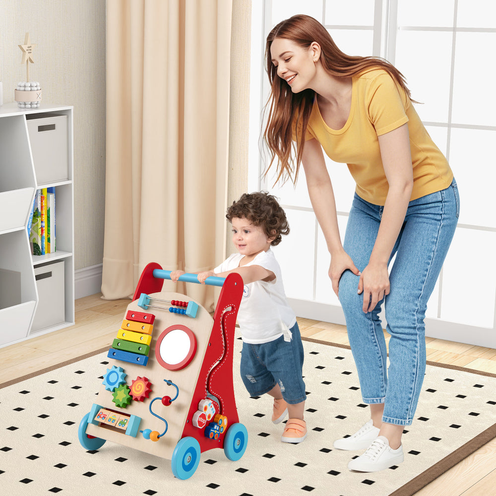 Colorful baby push walker with handle and wheels, designed for toddlers 3+, promoting motor skills and safe play.