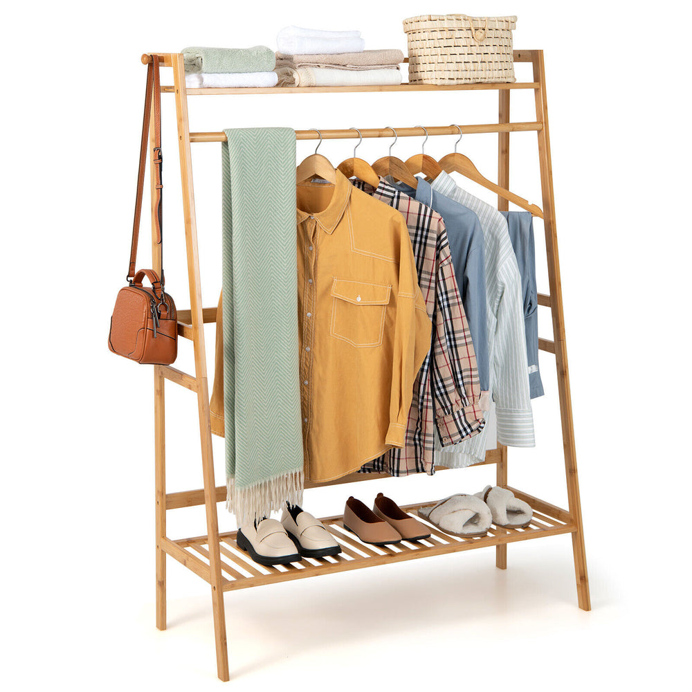 Bamboo clothing rack with hanging rod, 2-tier shelves, and side hooks for versatile storage in natural finish.