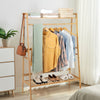 Bamboo clothing rack with hanging rod and 2-tier shelves, ideal for bedroom or entryway storage and organization.