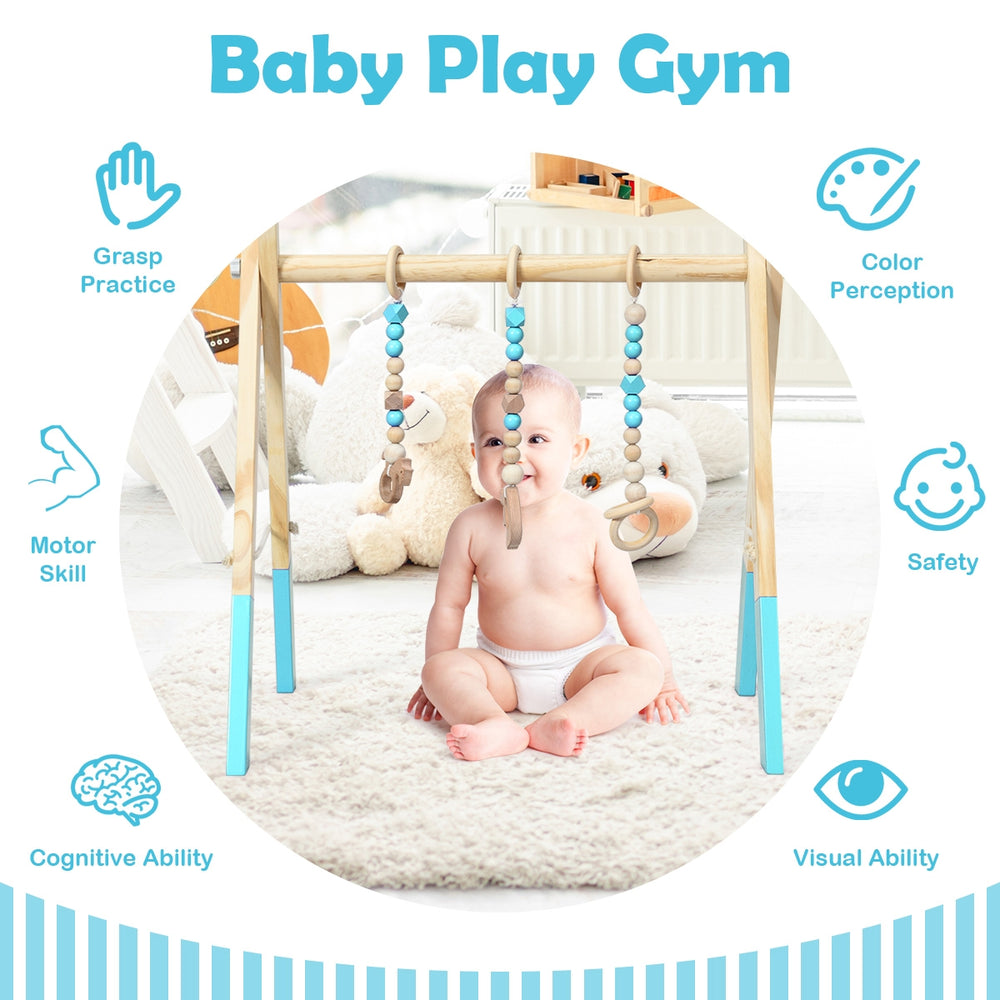 Portable wooden baby play gym in blue, featuring teething toys and designed for physical and cognitive development.