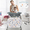 Portable baby changing table in gray with storage basket, adjustable heights, and safety features for easy diaper.