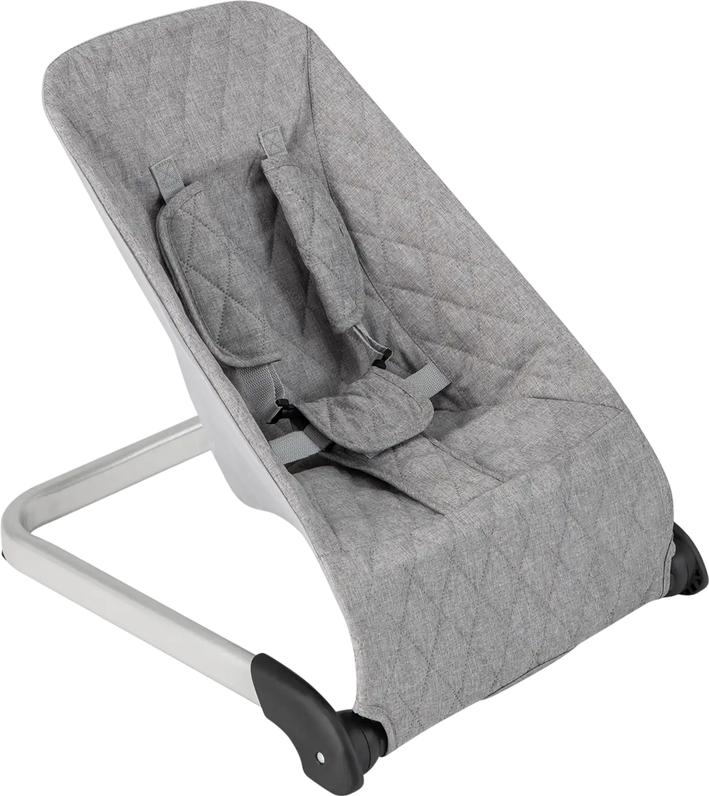 Light gray baby bouncer seat with a sturdy aluminum frame, featuring a 5-point harness for safety and ergonomic support.