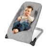 Light gray baby bouncer seat with a secure 5-point harness, ergonomic design, and sturdy aluminum frame for soothing.