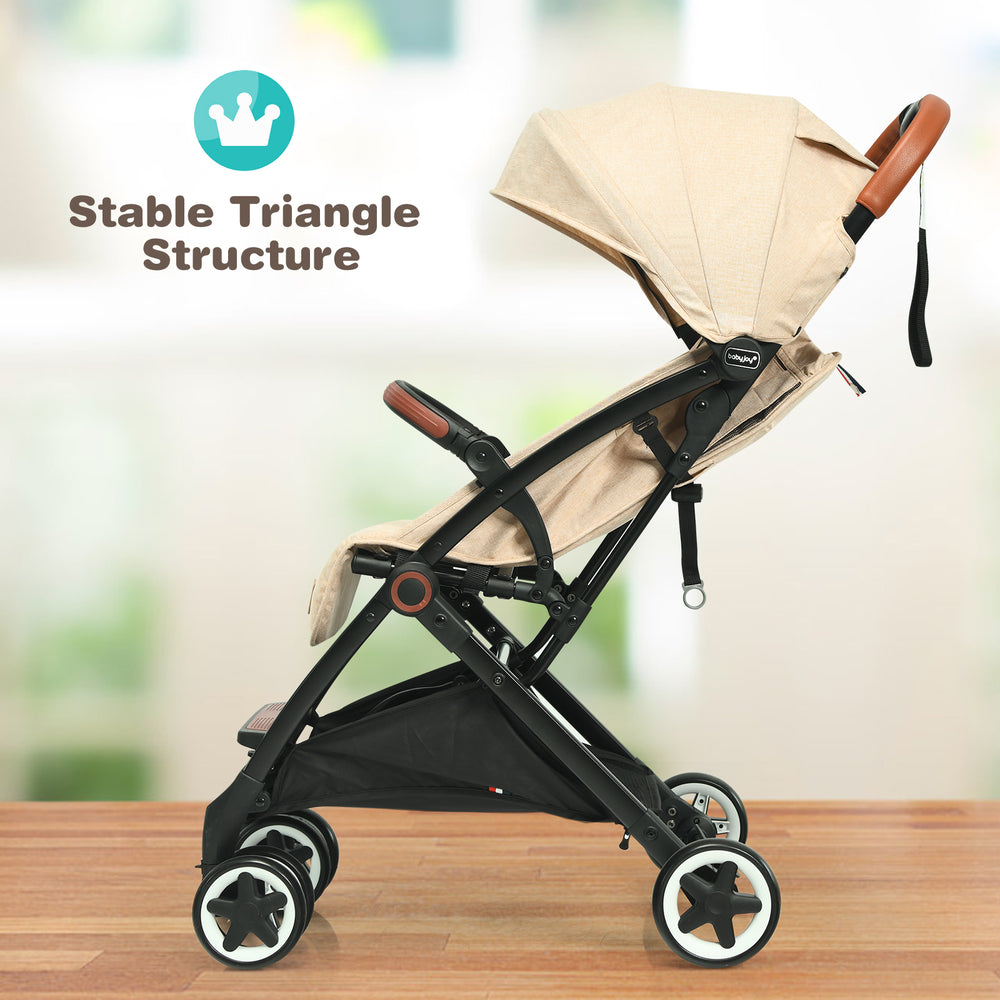 Lightweight beige baby stroller with adjustable backrest, telescopic canopy, and stable triangle structure for safety.