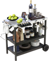 Foldable black outdoor cart with 3 tiers, stainless steel top, and wheels for easy mobility, ideal for food preparation.