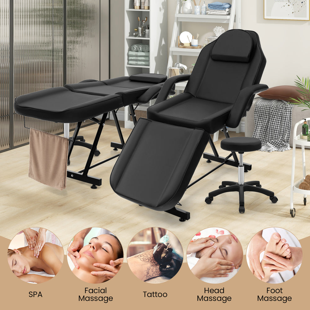 Black facial chair set with a 360° swivel stool, removable armrests, and towel rack for versatile spa and massage.