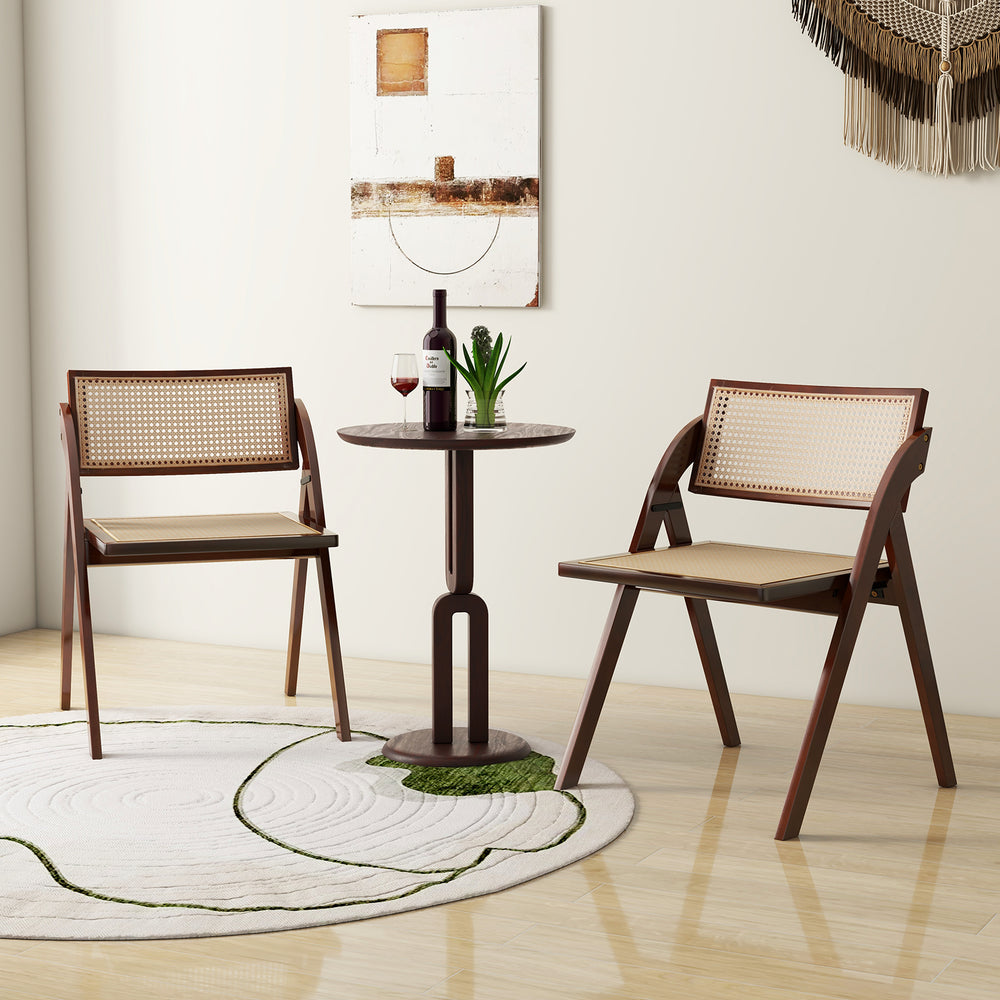 Foldable dining chairs set of 2 with woven rattan backrest in brown, featuring sturdy rubber wood frame for stability.