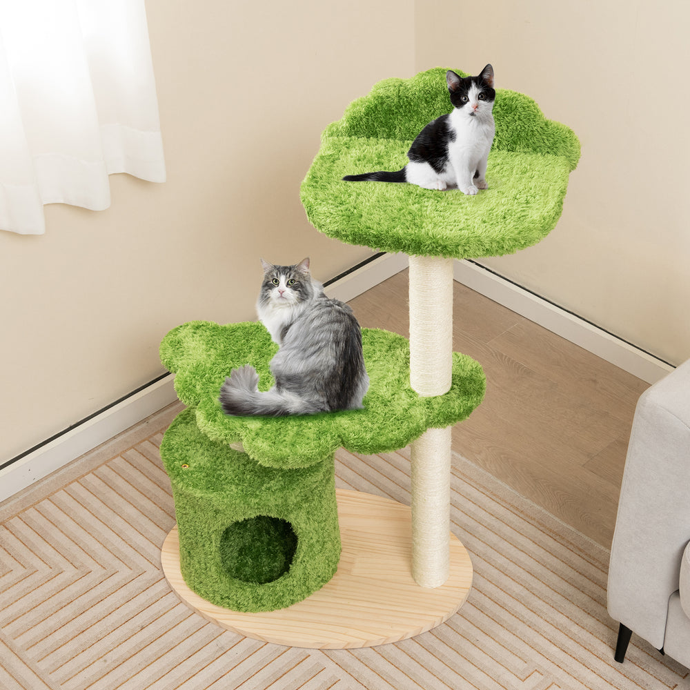 Cat tree with green cloud-shaped design, featuring cozy condo, sisal scratching posts, and removable cushions for.
