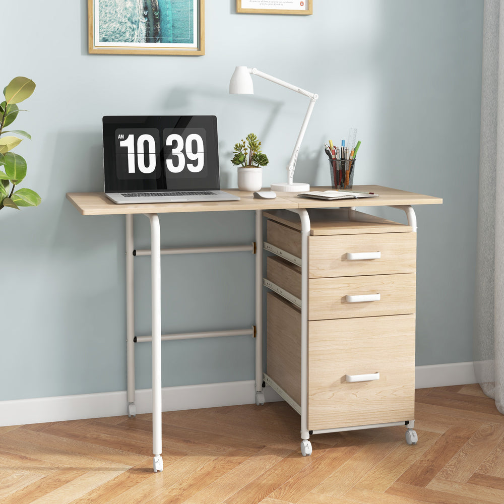 Folding computer desk featuring a sleek design, sturdy construction, and three drawers for organized storage in small.