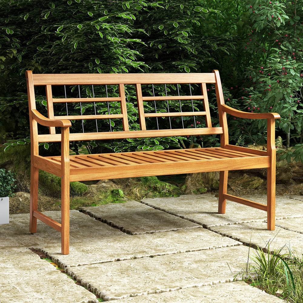 Acacia wood patio bench with curved armrests, slatted seat, and backrest, perfect for garden or poolside relaxation.