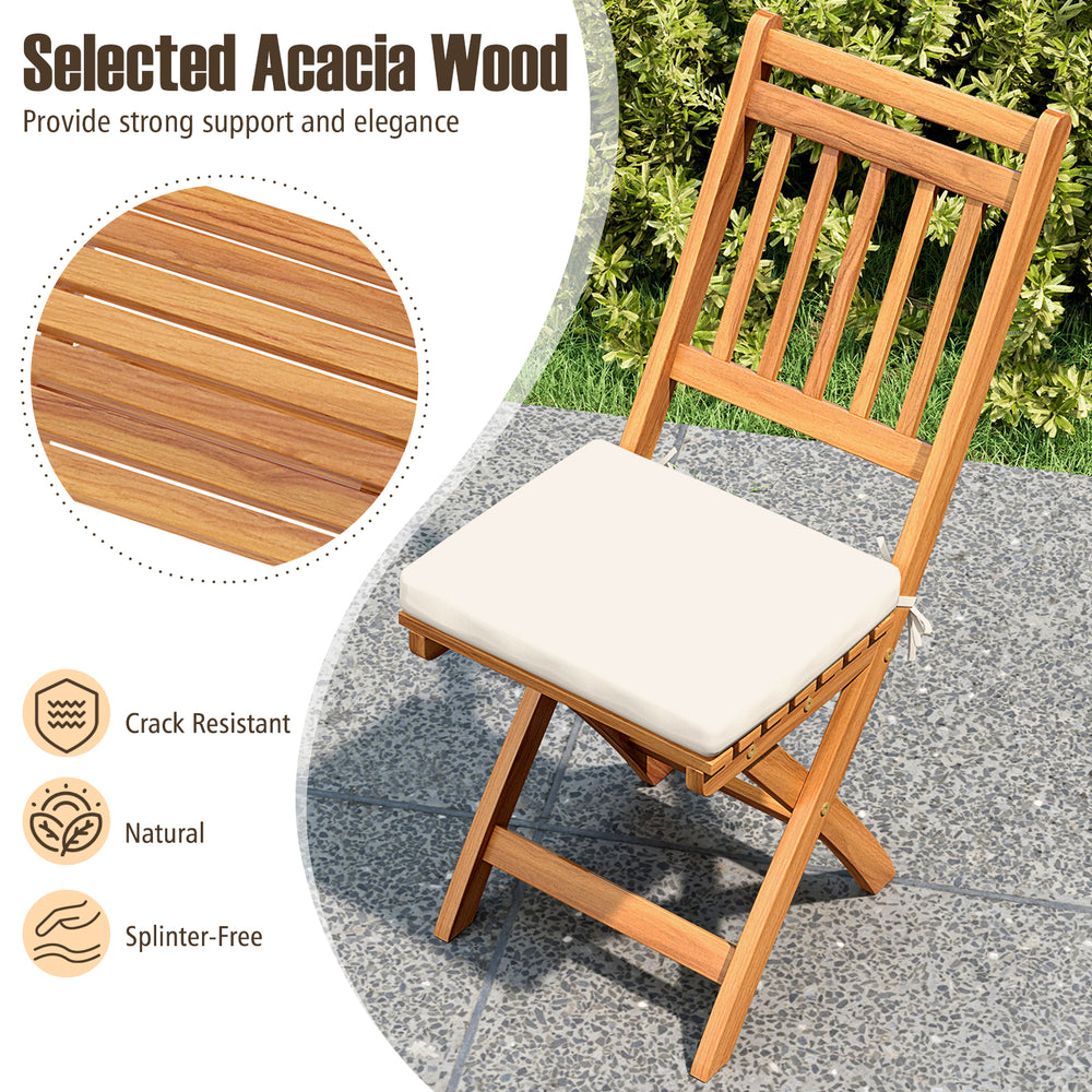 Folding patio chair made of acacia wood with soft cushion, ideal for backyard and poolside relaxation.