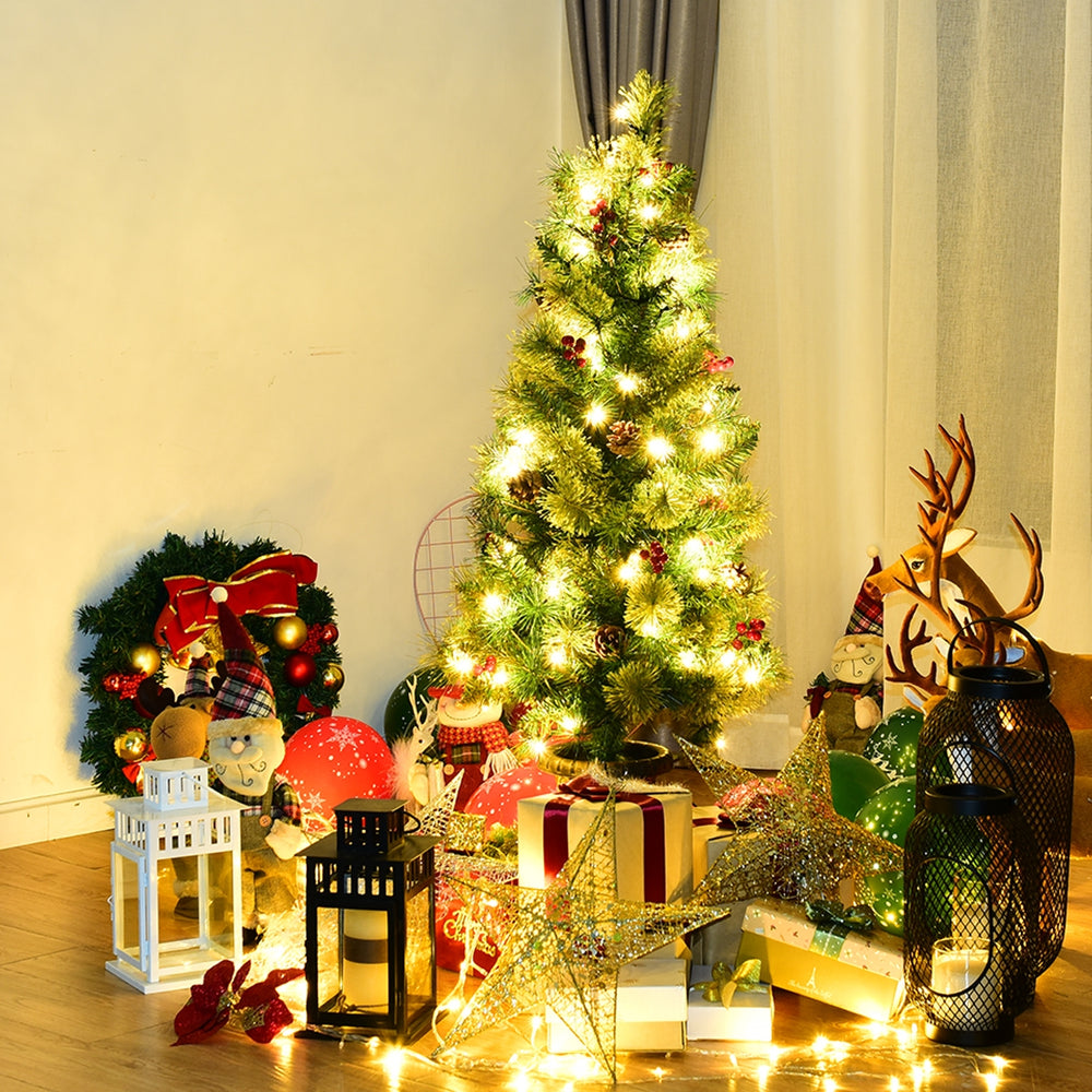 LED Christmas tree with red berries and pine cones, pre-lit with warm white lights, perfect for festive home decor.