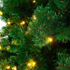 Close-up of the 9 ft pre-lit PVC artificial Christmas tree featuring 700 warm white LED lights and lush green branch.