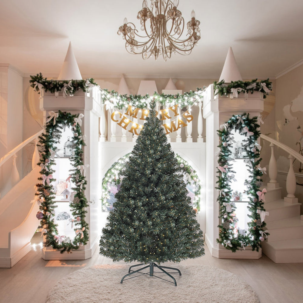 4.5 feet pre-lit artificial Christmas tree with 200 warm white LED lights, perfect for indoor holiday decoration.
